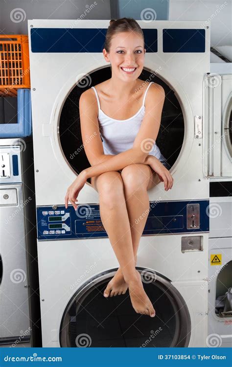 woman sitting on washing machine|clothes left in washer overnight.